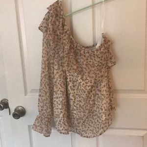 One shoulder floral top with a ruffled neck
